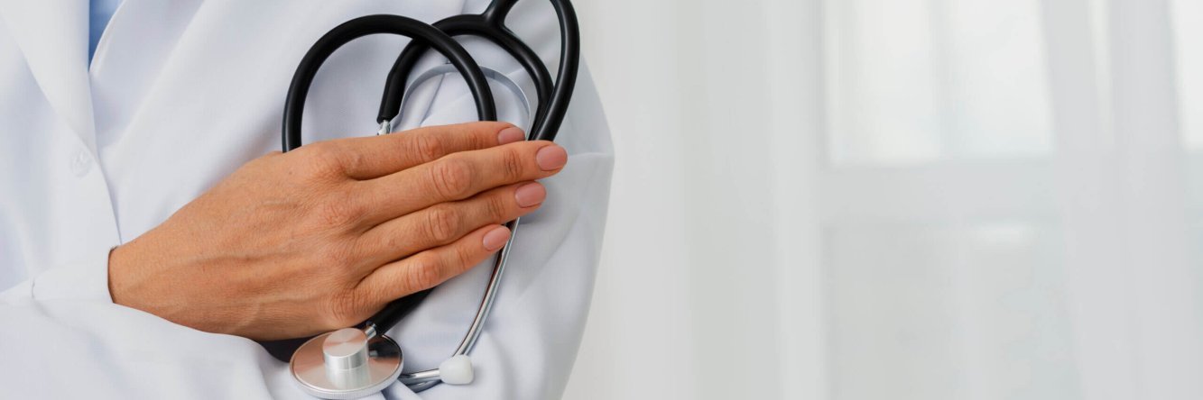 doctor-holding-stethoscope-arm